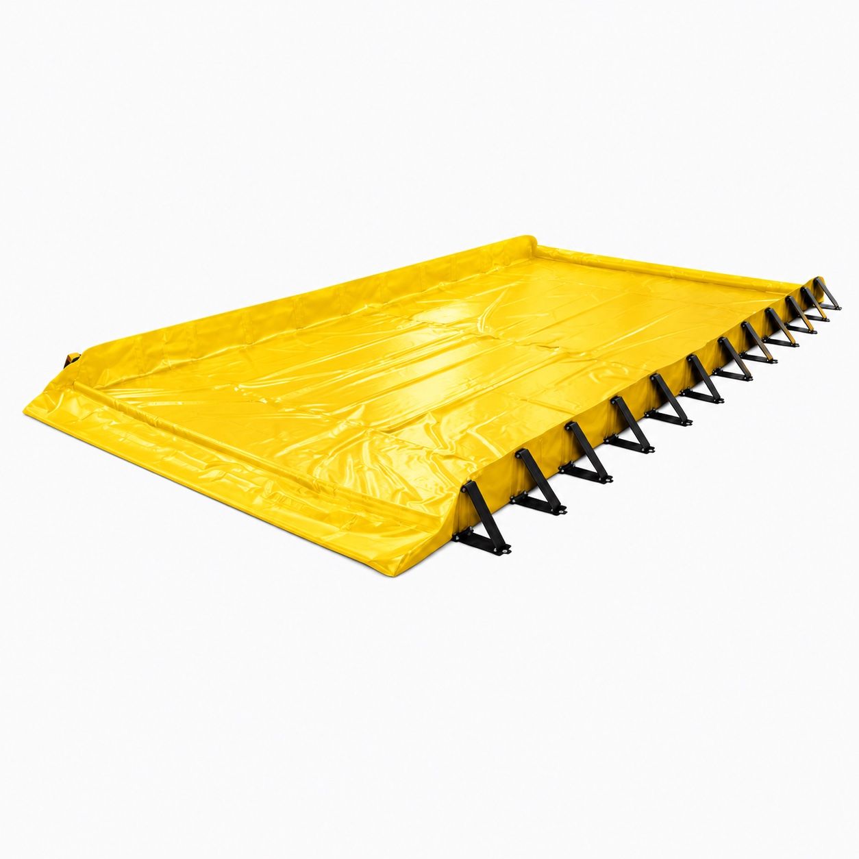 Long yellow PVC drive-through spill containment berm: a row of black triangular stays braces the long side wall, and the end walls lie flat as low ramps for a vehicle to cross